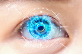 Close-up blue eye. High technology the futuristic.